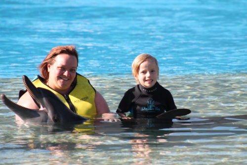 Holding the dolphin at Dolphin Bay, Atlantis The Palm