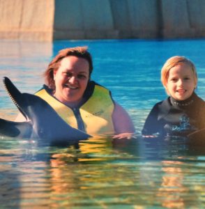 Patting the dolphin at Dolphin Bay, Atlantis The Palm