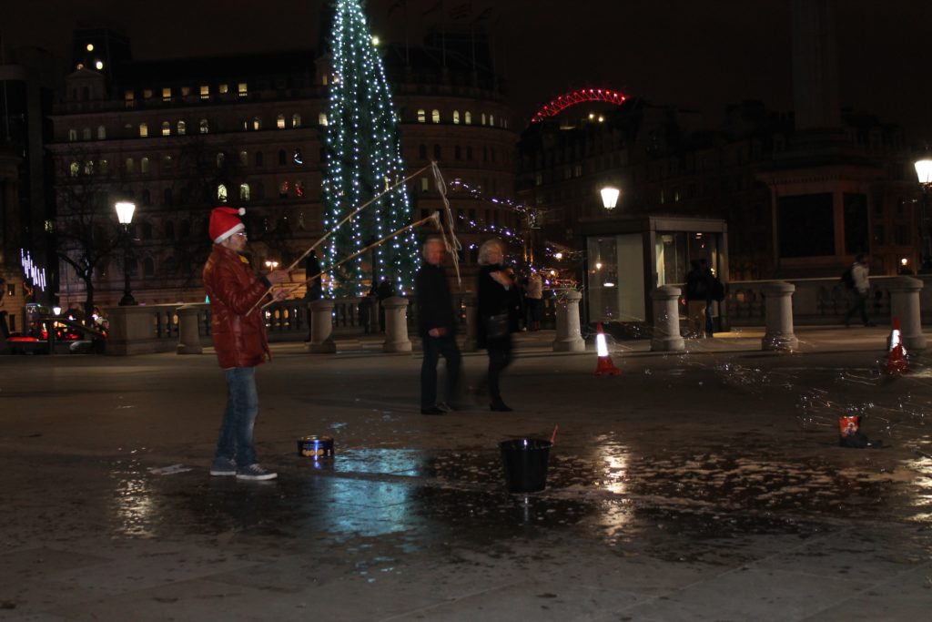 Bubble Street Performer in Trafalgar Square at Night