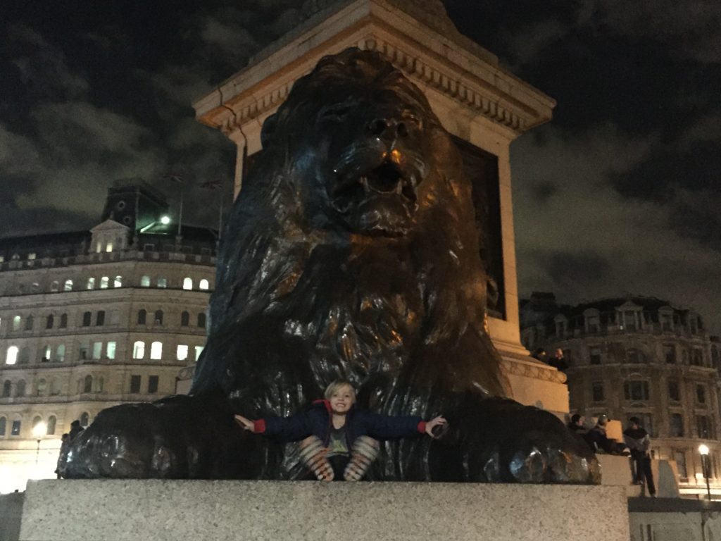 Me sitting with the Trafalgar Square Lion - Also one of the Doctor Who filming locations