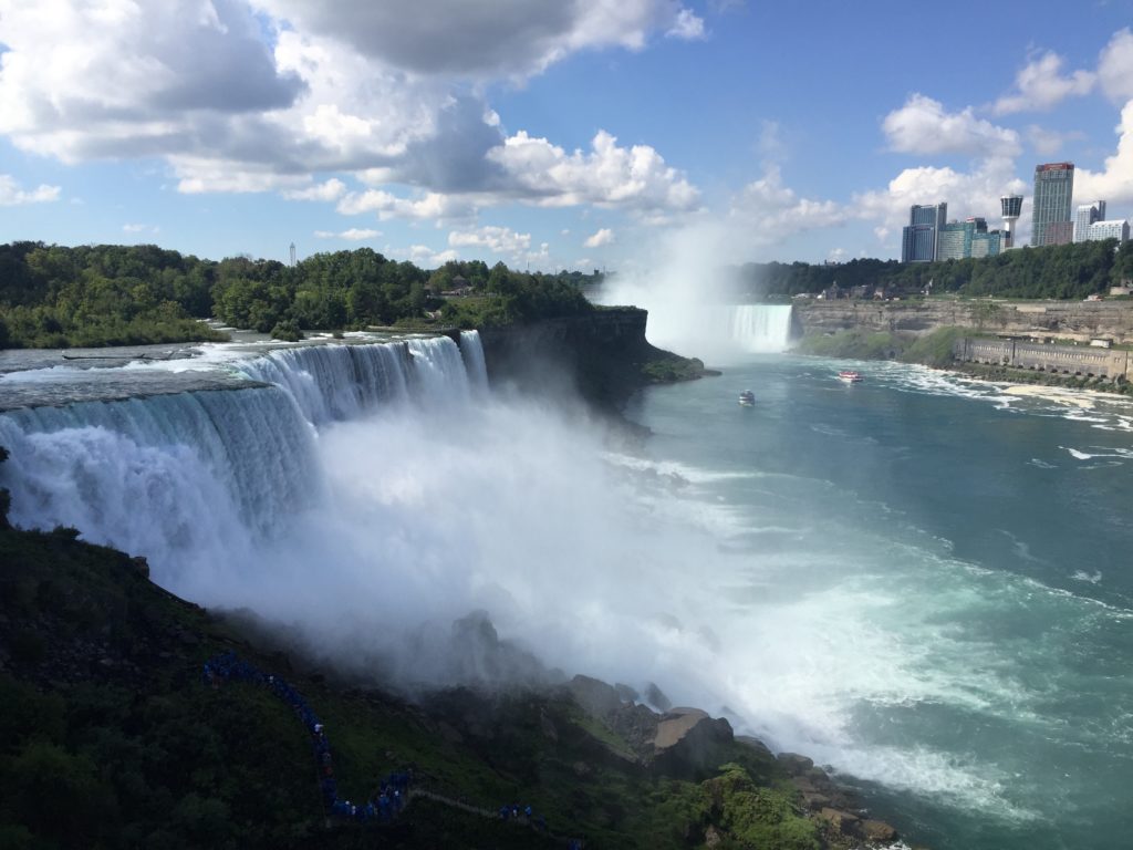 This shows not only the first of the falls but you can also see the Maid of the Mist boat making it's journey to the biggest falls and Hornblower making it's way out of the falls. Both boats from this position see Niagara falls from Canadian side. 