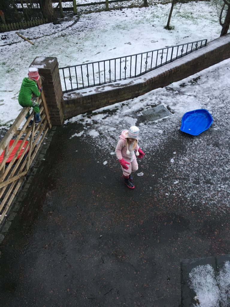 The kids were sledding from the top of the driveway to the farm gate when we had only a little bit of icy snow. Nercwys, January 2017.