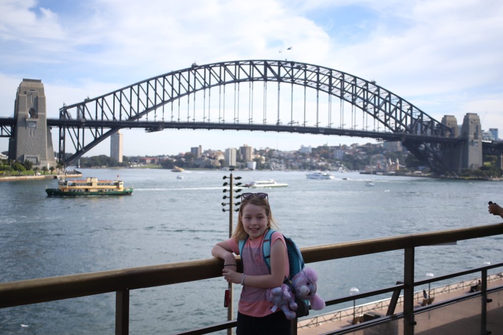 ArgeyDaughter at the Sydney Opera House looking out to the Sydney Harbour Bridge